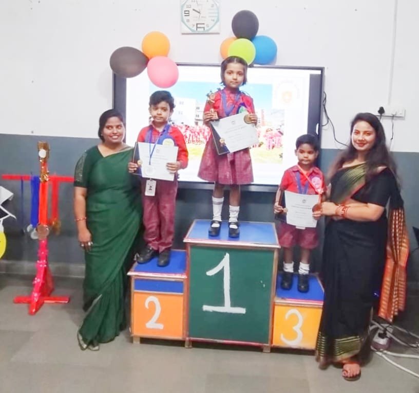 Young students receiving certificates